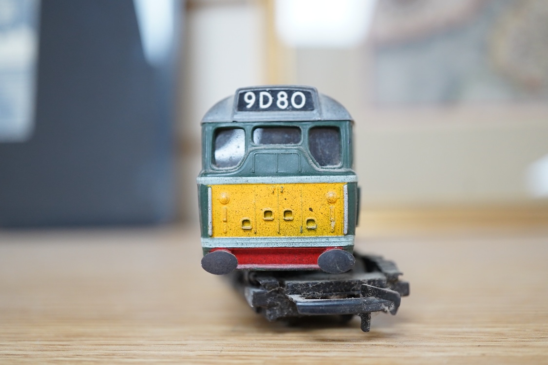 A quantity of 00 gauge railway by various makes, comprising; nine locomotives by Tri-ang, Hornby Dublo, etc. (one missing tender), sixteen maroon bogie coaches and eighteen freight wagons